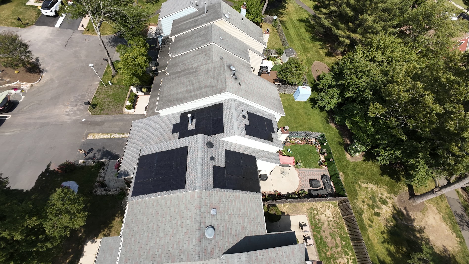 Aerial view of a 28 panel rooftop solar installation on a townhome in East Brunswick, New Jersey
