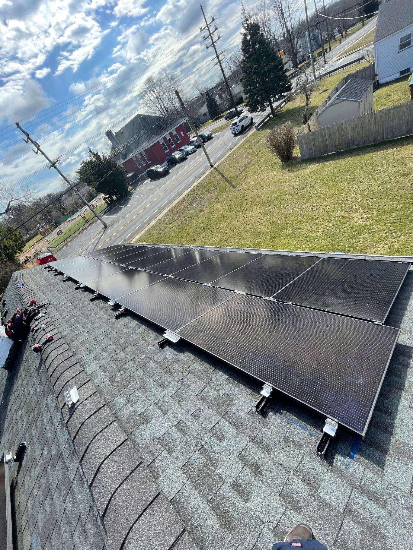 34 panel all-black solar array installed on a shingle roof in Neptune, New Jersey