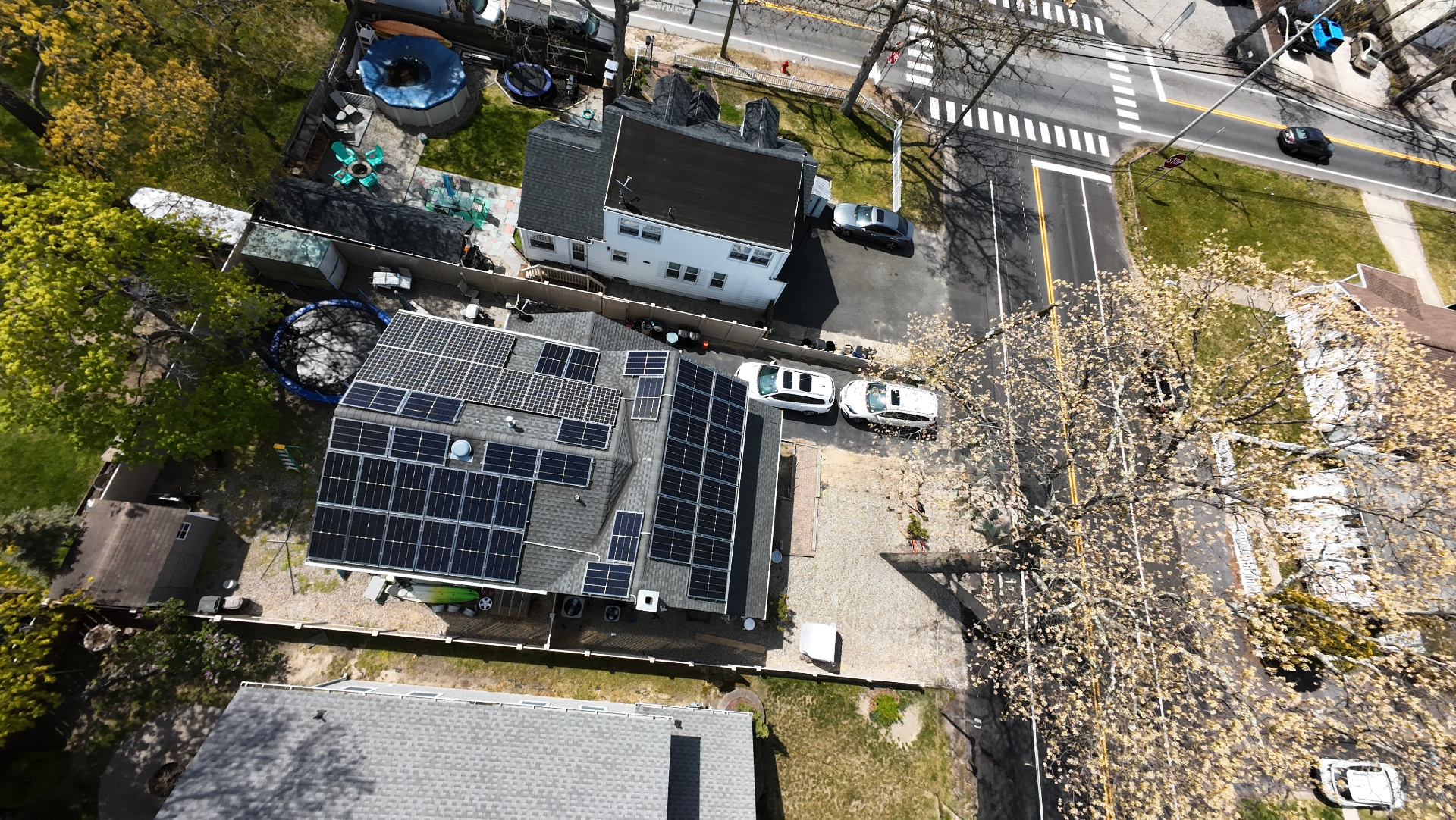 Aerial view of 39 defective solar panels replaced with new Trina panels on a shingle roof home in Point Pleasant, New Jersey